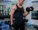 Fitness athlete lifting weights with visual illustrations of peptides and muscle recovery concepts